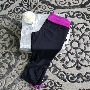 NWT Kyodan black and purple athletic capris.  SZ L